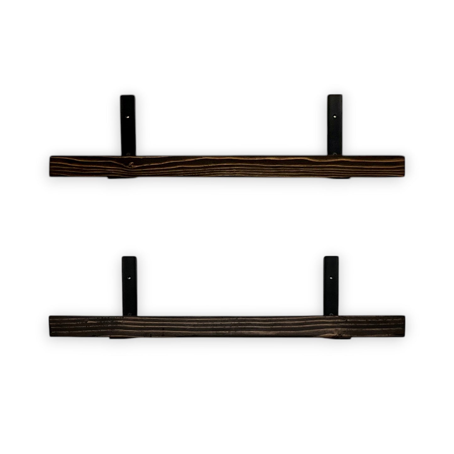Two dark wooden shelves with brackets on a white background