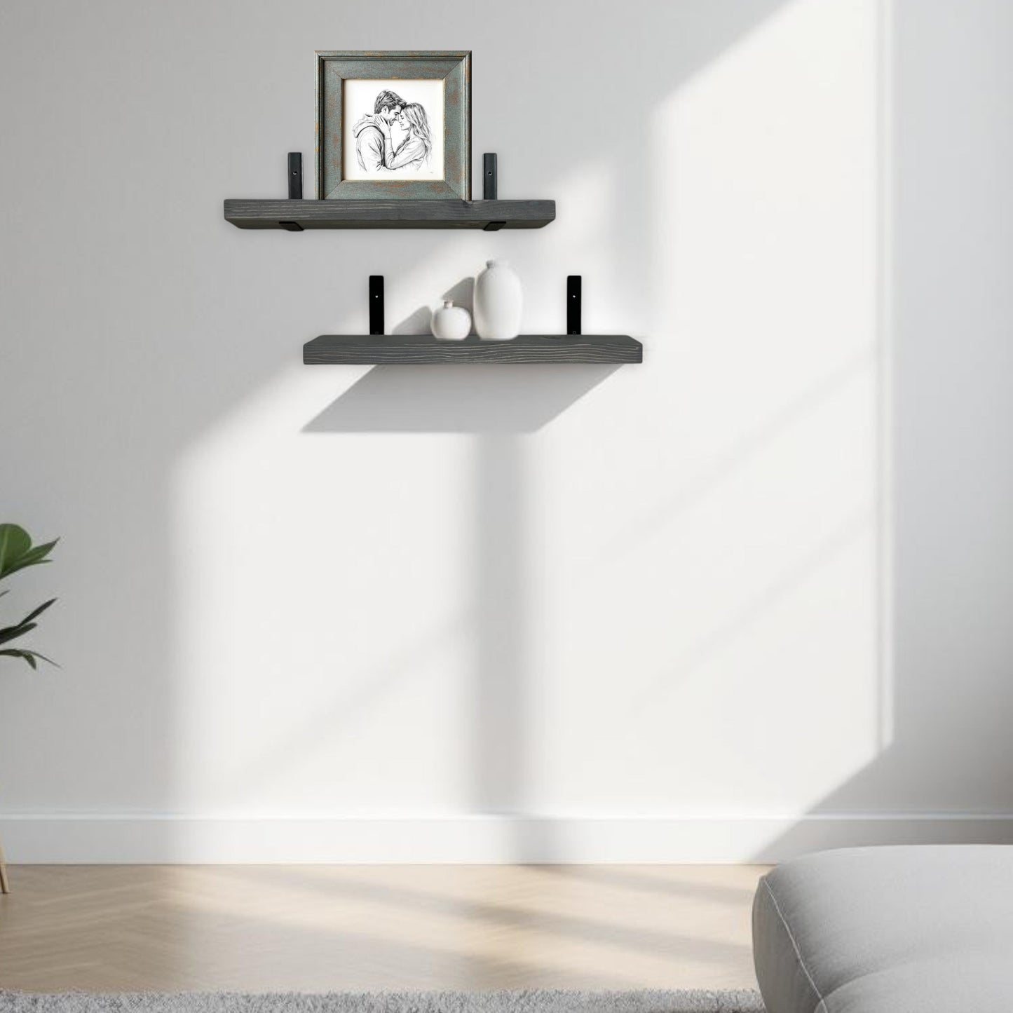 Modern living room with a white sofa, decorative shelves, and a plant.