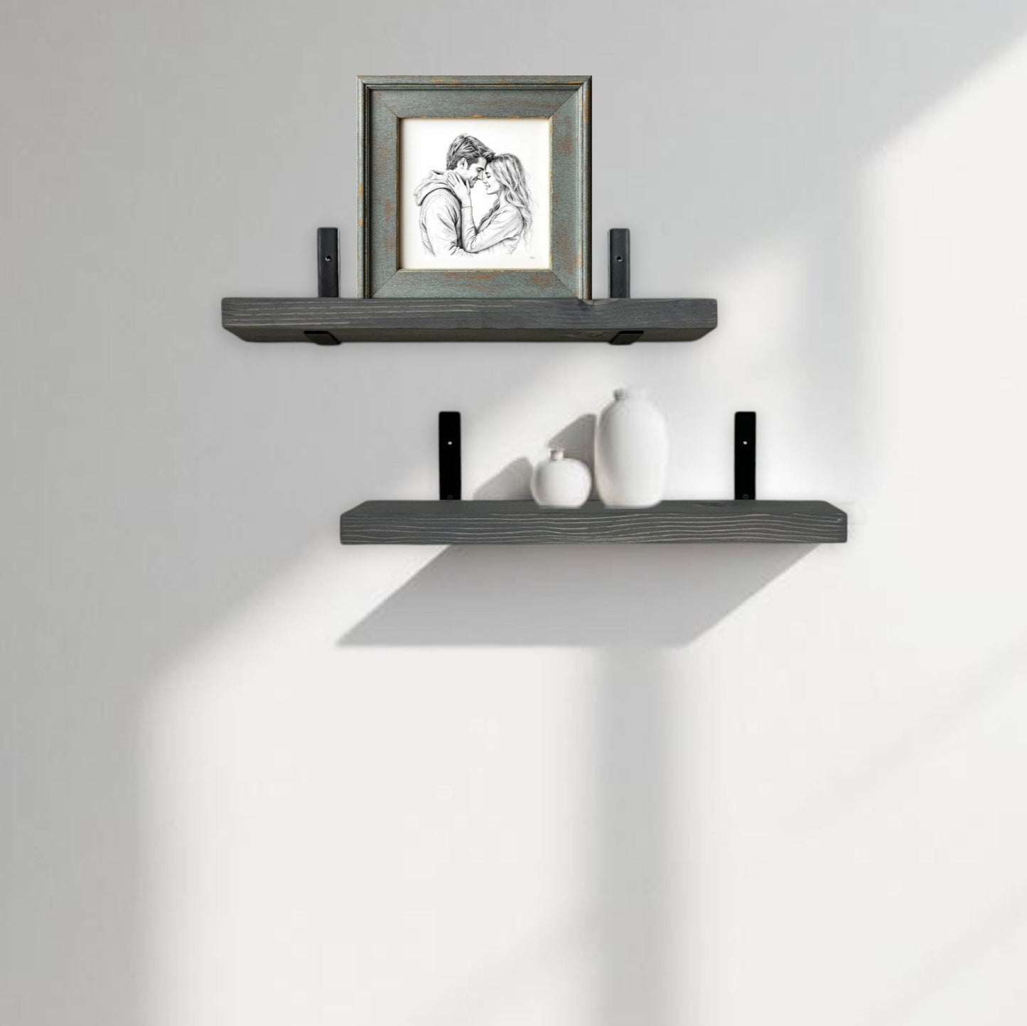 Two floating shelves with decorative items against a plain wall