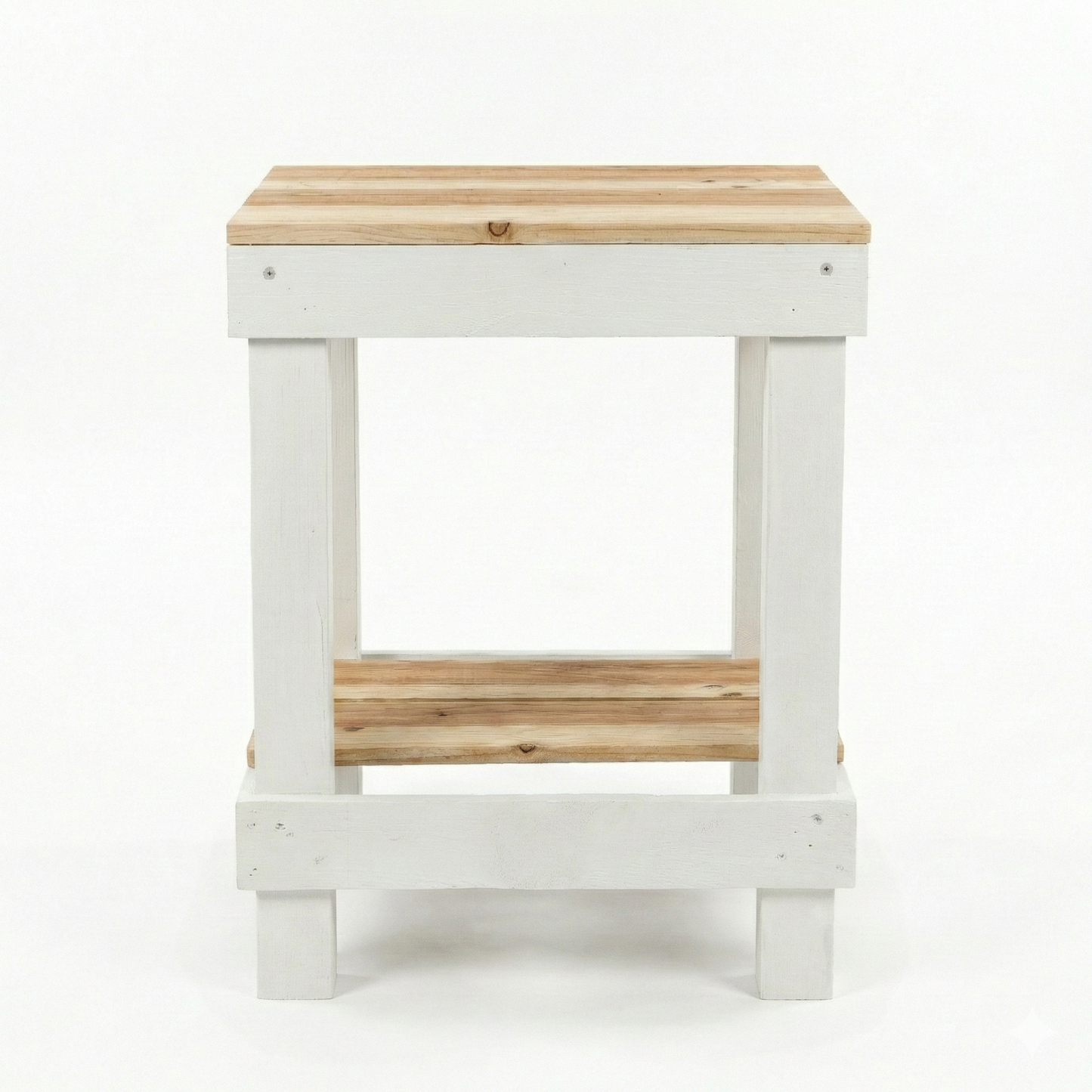 Rustic farmhouse solid wood handmade end table with open shelves and natural finish next to gray sofa.