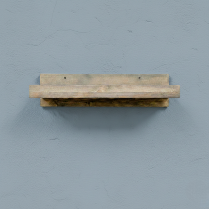 Rustic gray solid wood floating wall shelf with integrated hanging wine glass rack, handmade furniture.