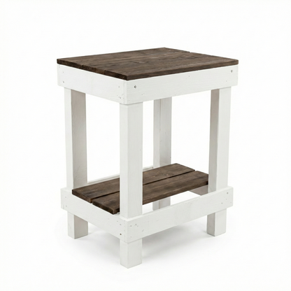 Rustic farmhouse solid wood handmade end table with open shelves and natural finish next to gray sofa.