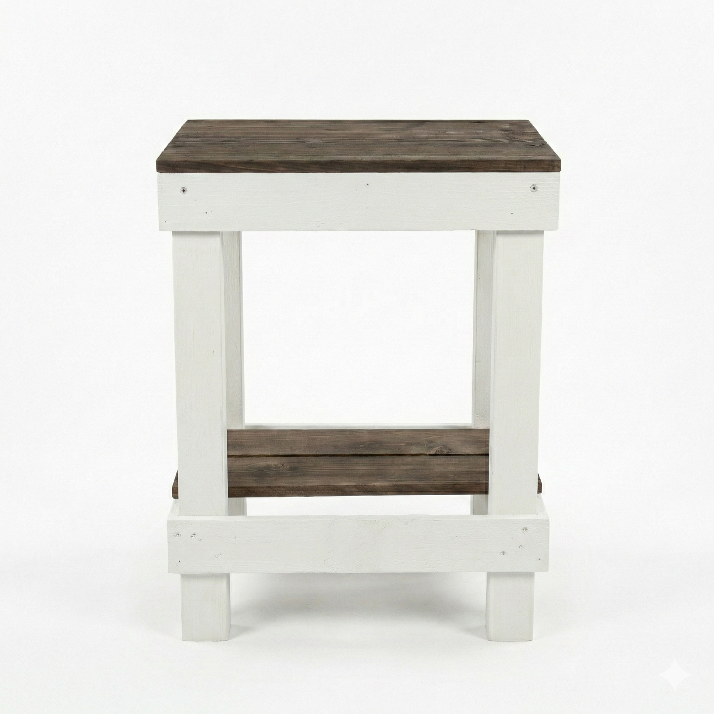 Rustic farmhouse solid wood handmade end table with open shelves and natural finish next to gray sofa.