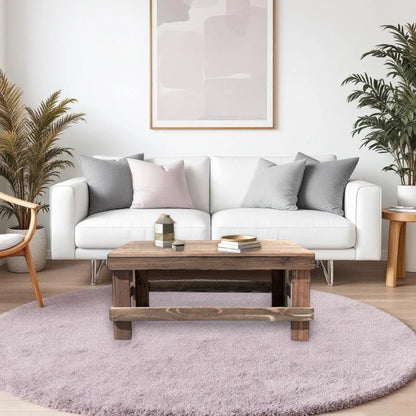 White solid wood coffee table with a plank top in modern rustic furniture style.
