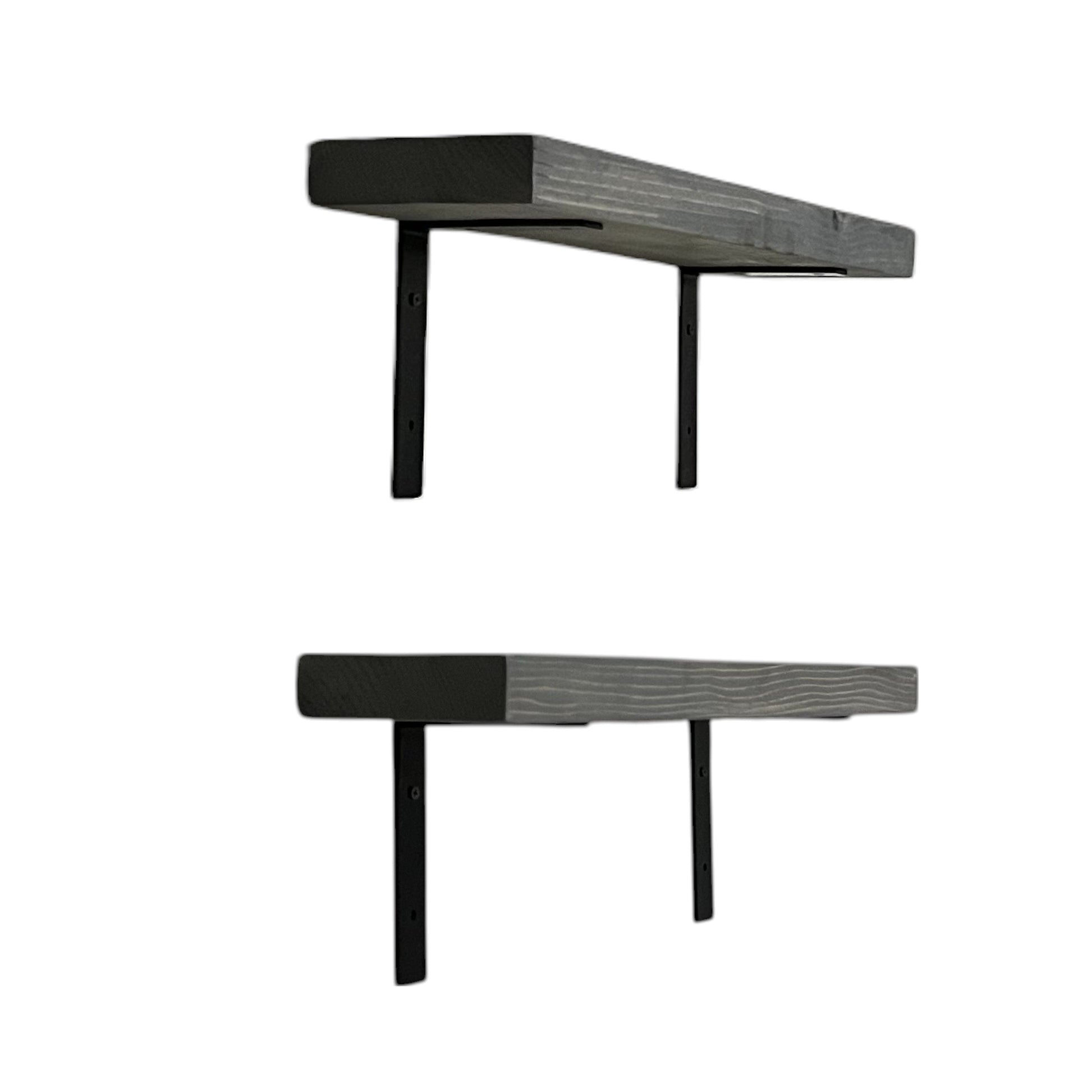 Two black wall-mounted shelves on a white background