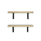 Two wooden shelves with black brackets on a white background