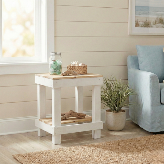 Rustic farmhouse solid wood handmade end table with open shelves and natural finish next to gray sofa.