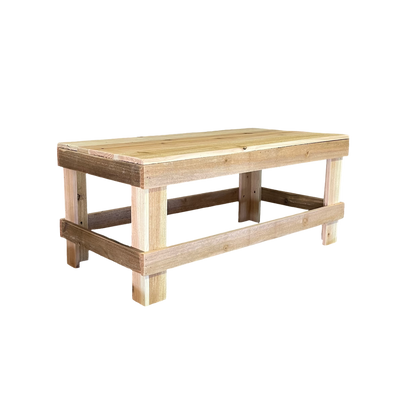 White solid wood coffee table with a plank top in modern rustic furniture style.