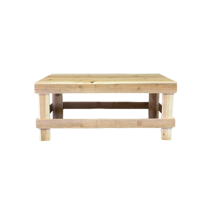 White solid wood coffee table with a plank top in modern rustic furniture style.