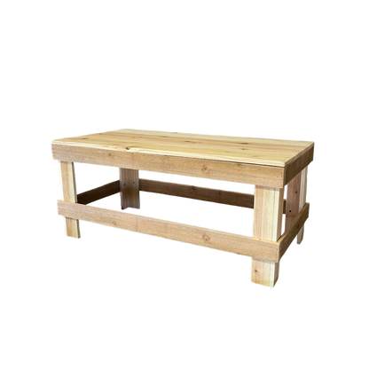 White solid wood coffee table with a plank top in modern rustic furniture style.