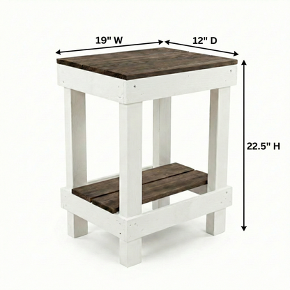 Rustic farmhouse solid wood handmade end table with open shelves and natural finish next to gray sofa.