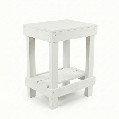 Rustic farmhouse solid wood handmade end table with open shelves and natural finish next to gray sofa.
