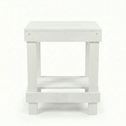 Rustic farmhouse solid wood handmade end table with open shelves and natural finish next to gray sofa.