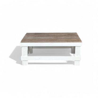 White solid wood coffee table with a plank top in modern rustic furniture style.