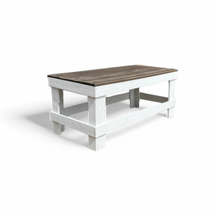 White solid wood coffee table with a plank top in modern rustic furniture style.
