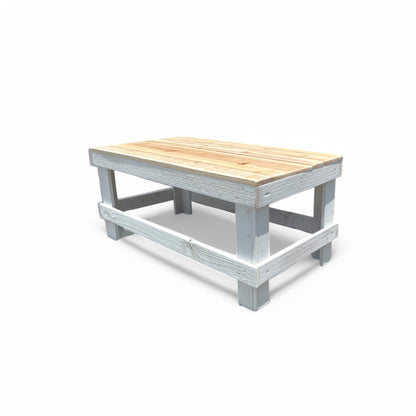 White solid wood coffee table with a plank top in modern rustic furniture style.
