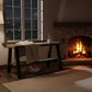 Solid wood furniture entryway bench with dark walnut top, white legs, and lower floating shelf in modern rustic style.