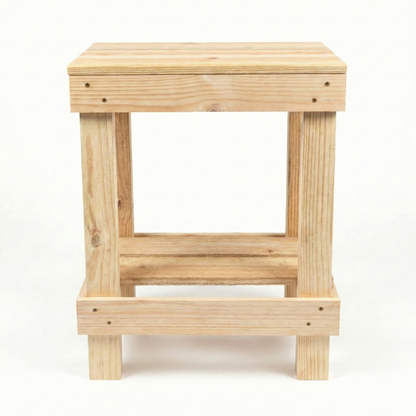 Rustic farmhouse solid wood handmade end table with open shelves and natural finish next to gray sofa.