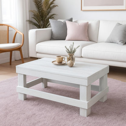 White solid wood coffee table with a plank top in modern rustic furniture style.